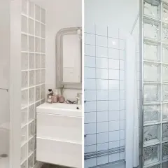 Ducha con mampara de cristal y pared de bloques de vidrio, ideal para evitar problemas de salpicaduras.