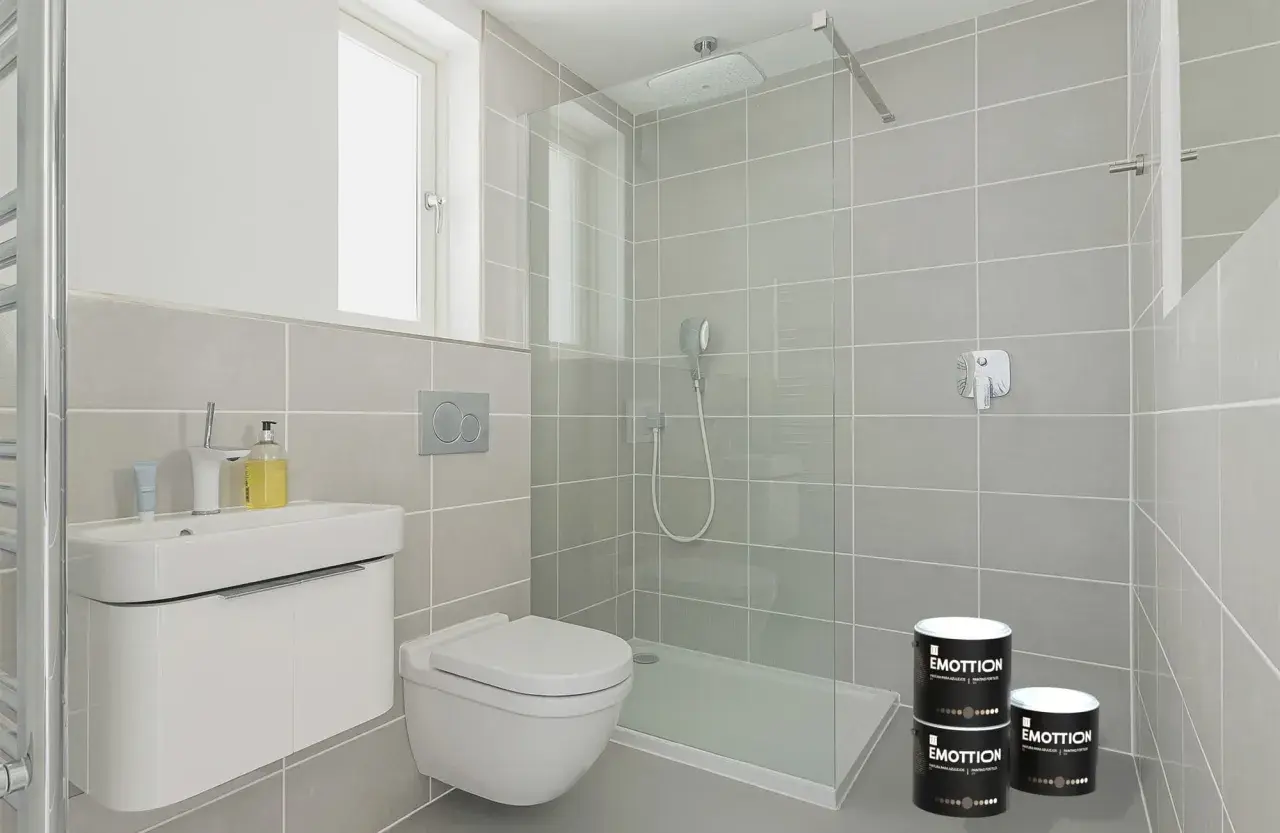 Moderno baño pequeño con ducha y lavabo. Latas de pintura para **pintar azulejos baño pequeño** listas para renovar.