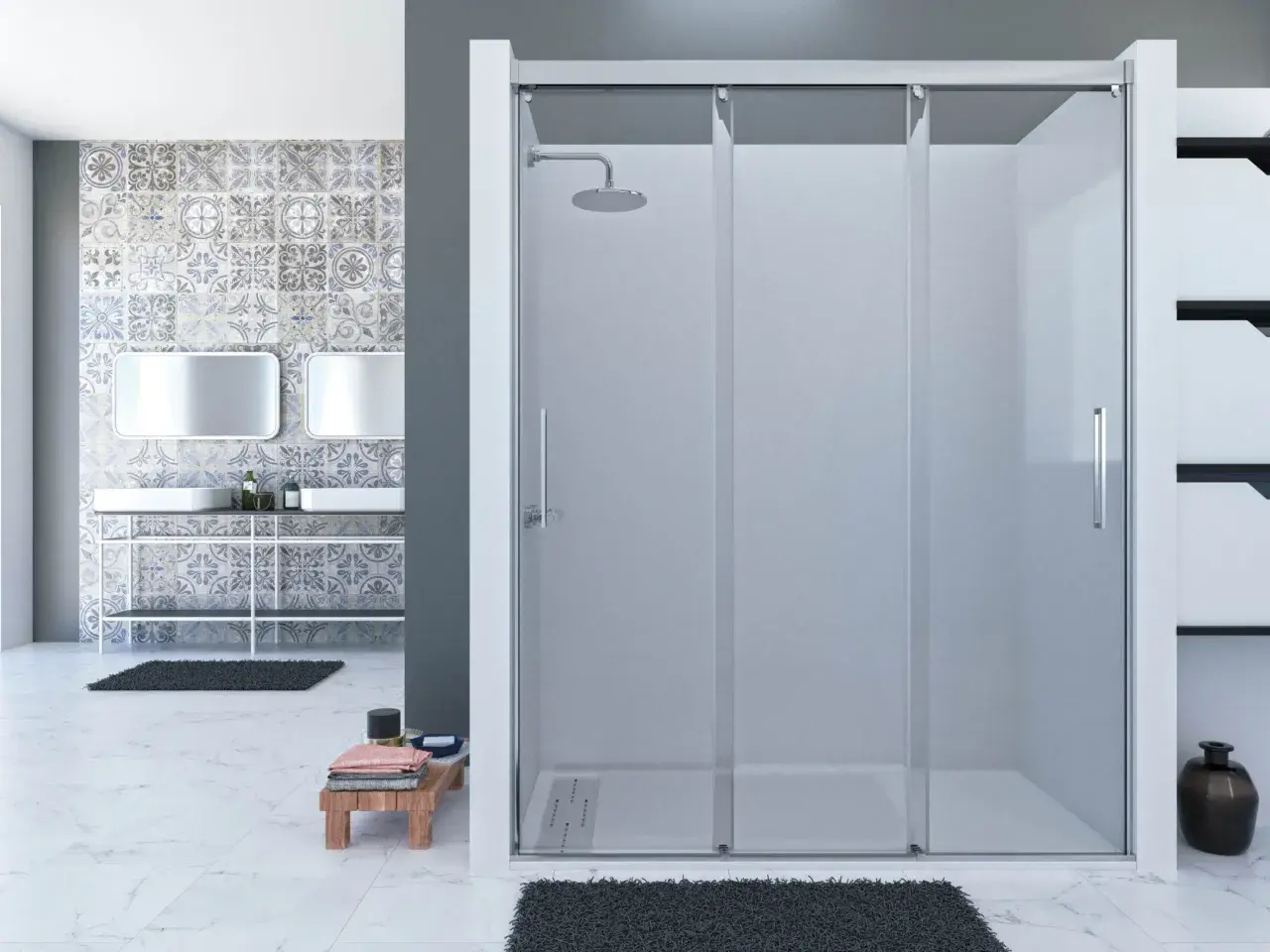 Mampara de ducha fija sin perfil inferior, con puertas correderas y rociador. Baño moderno con azulejos decorativos y lavabos dobles.
