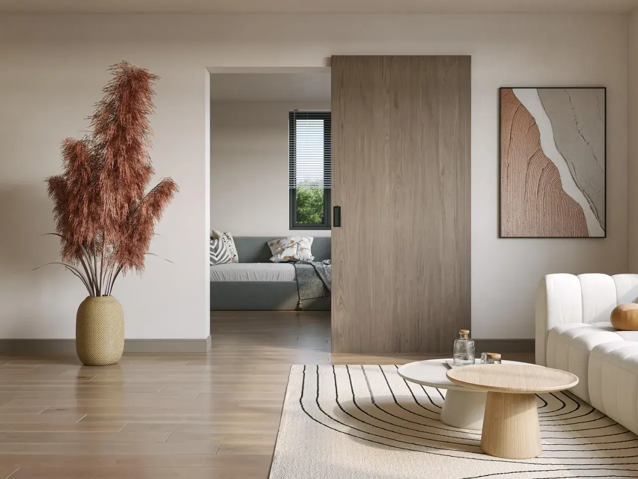 Instalar puerta corredera empotrada en un salón moderno con sofá gris, mesa de centro y planta decorativa.