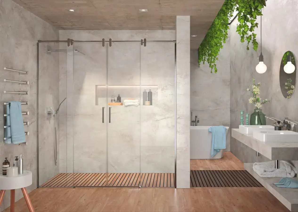 Ba&ntilde;o moderno con mampara de ducha de cristal. El suelo de madera y las paredes de hormig&oacute;n crean un ambiente elegante. Ideal para quitar silicona mampara.